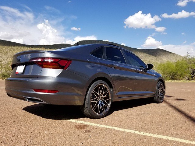 Volkswagen Jetta aftermarket wheels Volkswagen Jetta with aftermarket wheels — 5x112mm fitment