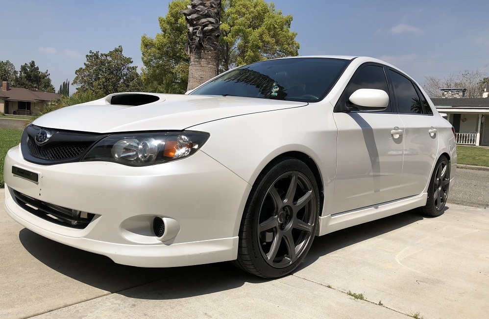 2009 narrowbody wrx with Work Emotion T7R rims